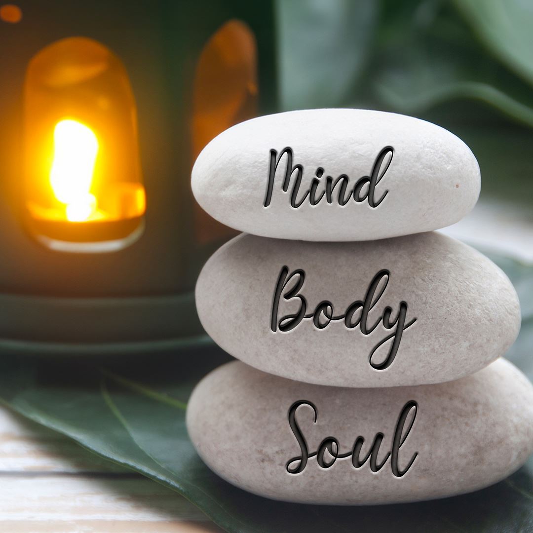 Wellness - Mind, body, soul stacking stones.